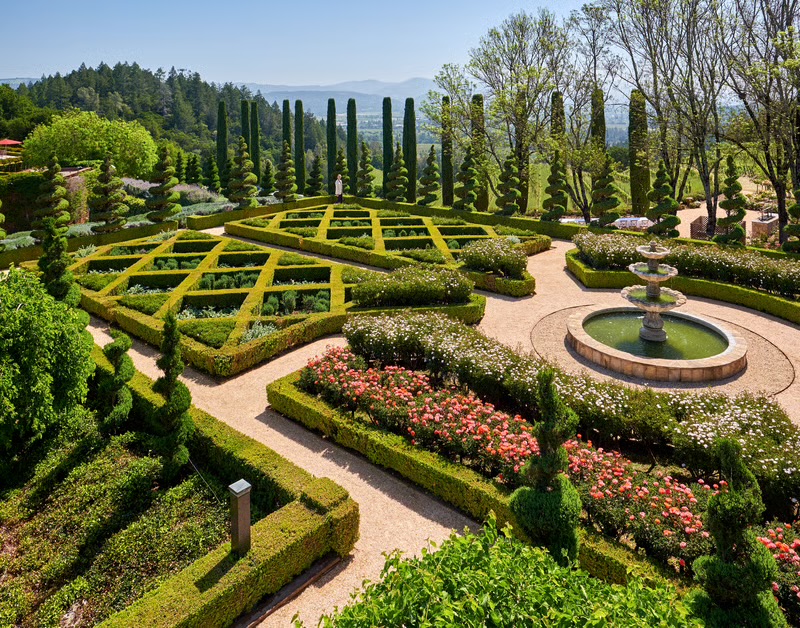 The Garden Courtyard — a formal garden with fountain